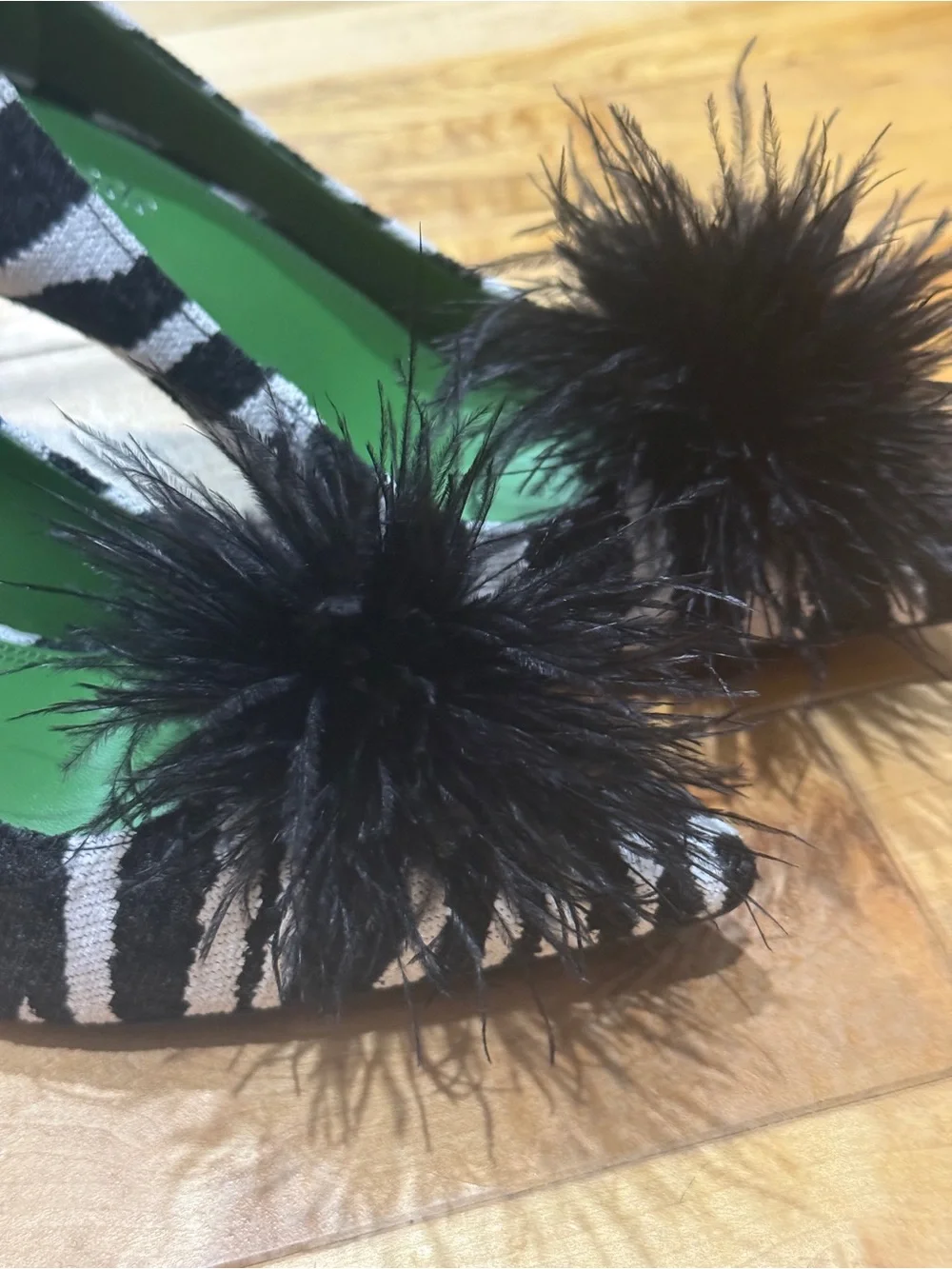 kate spade Black and White Zebra Pointed Toe Pumps with Black Feather Pom